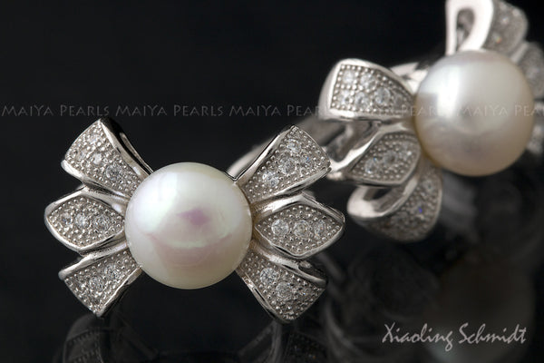 Stud Earrings - AA+ Round Pearls with Cubic Zirconium Settings